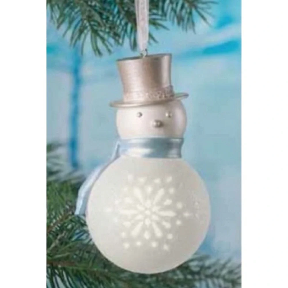 Hallmark 2011, Wonder and Light Pierced Snowman. Not Tested.